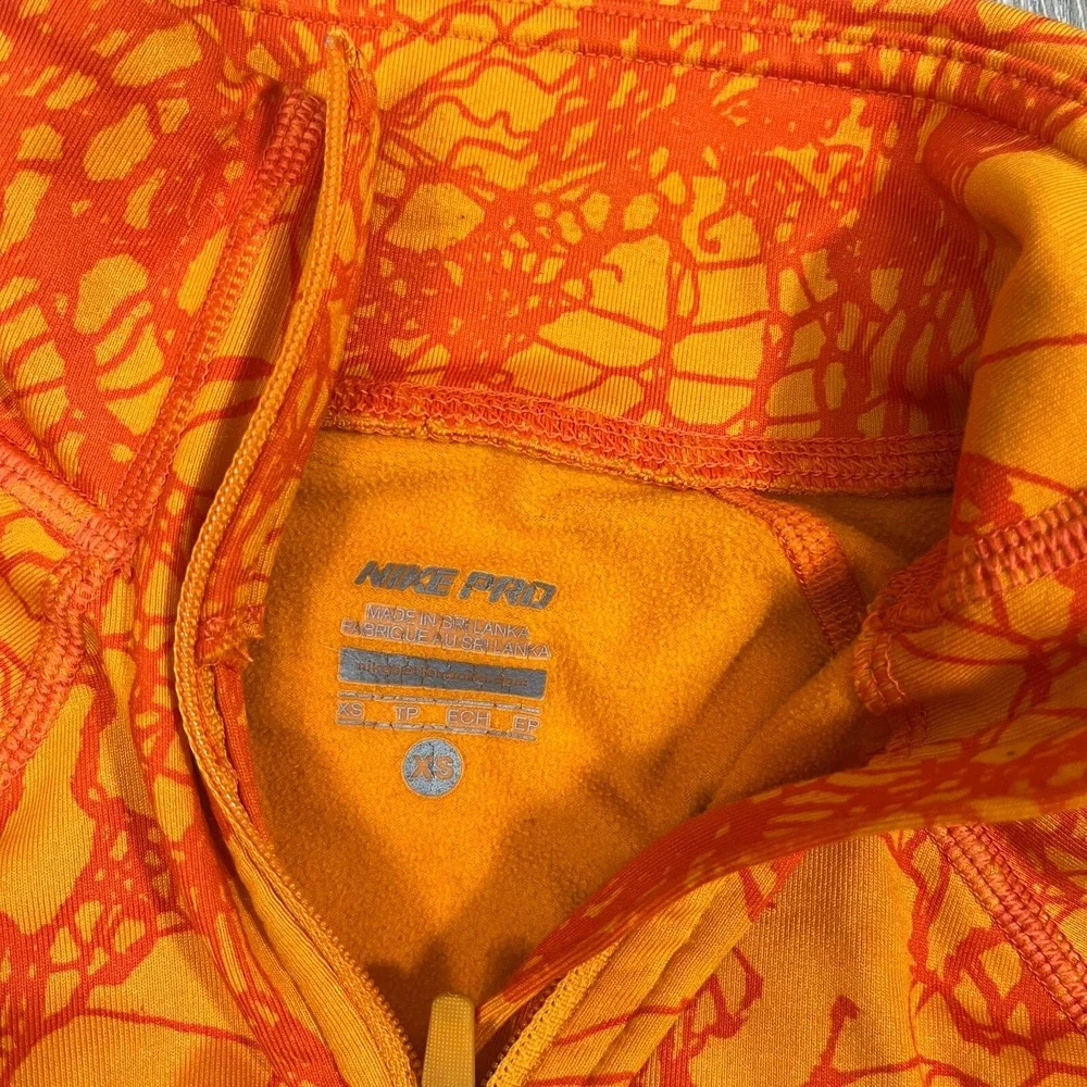 Nike Pro Women's Half Zip Size XS Orange Fleece Running Dri-Fit Thumb Holes